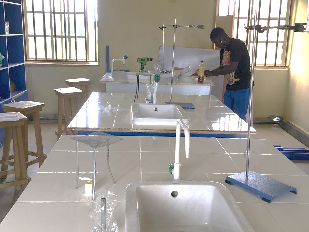 Chrysolite Scientific technician fitting out a school science laboratory